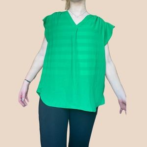 Green sleeveless blouse